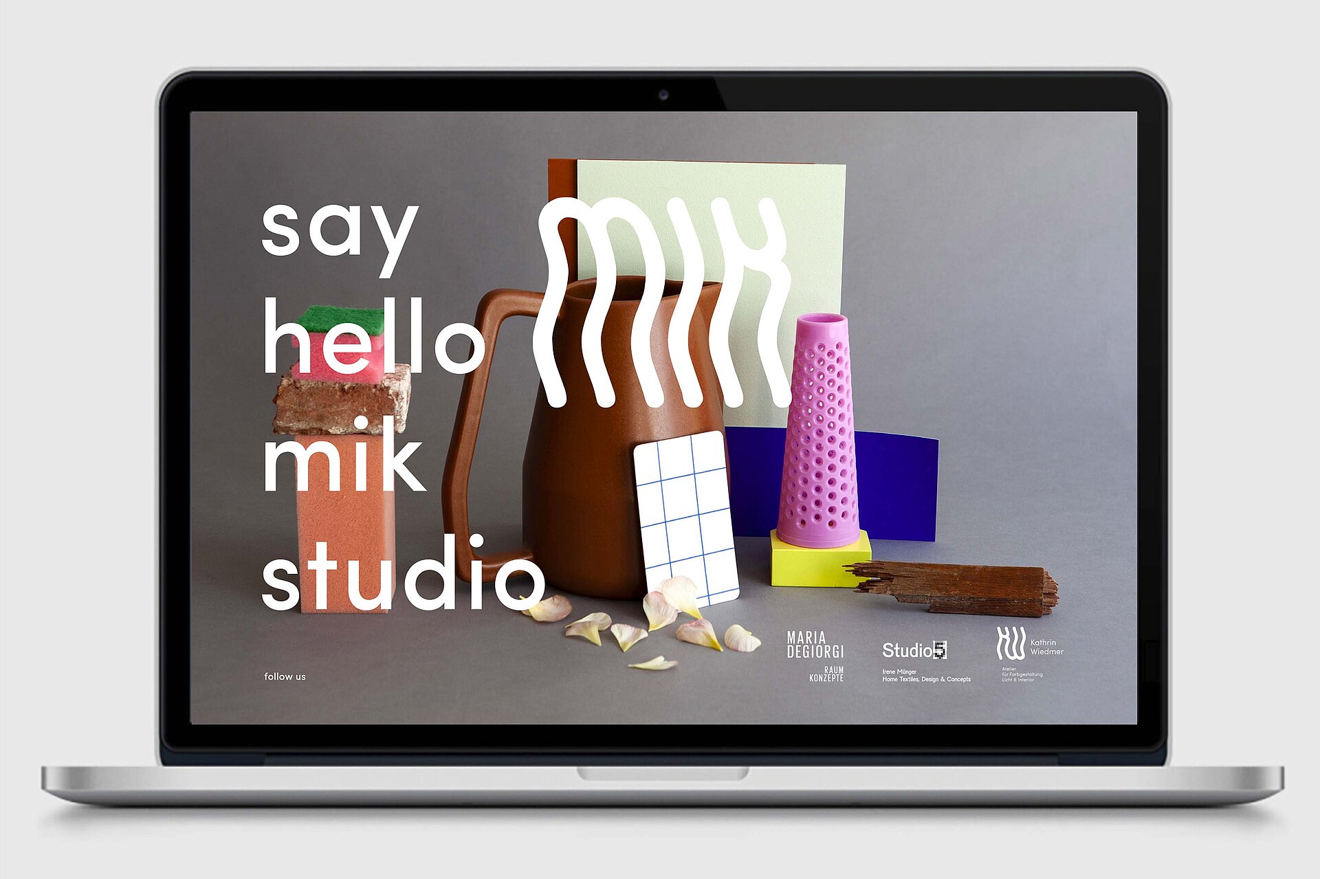 MIK atelier design website mockup macbook branding bern